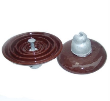 Disc suspension insulator string for transmission lines